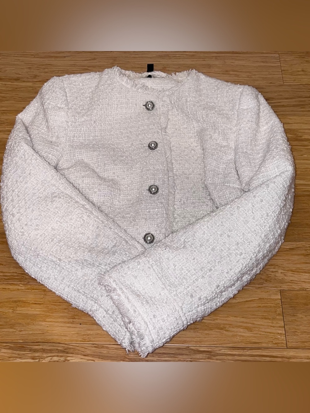 White Tweed Boucle Cropped Jacket with Pearl button details.